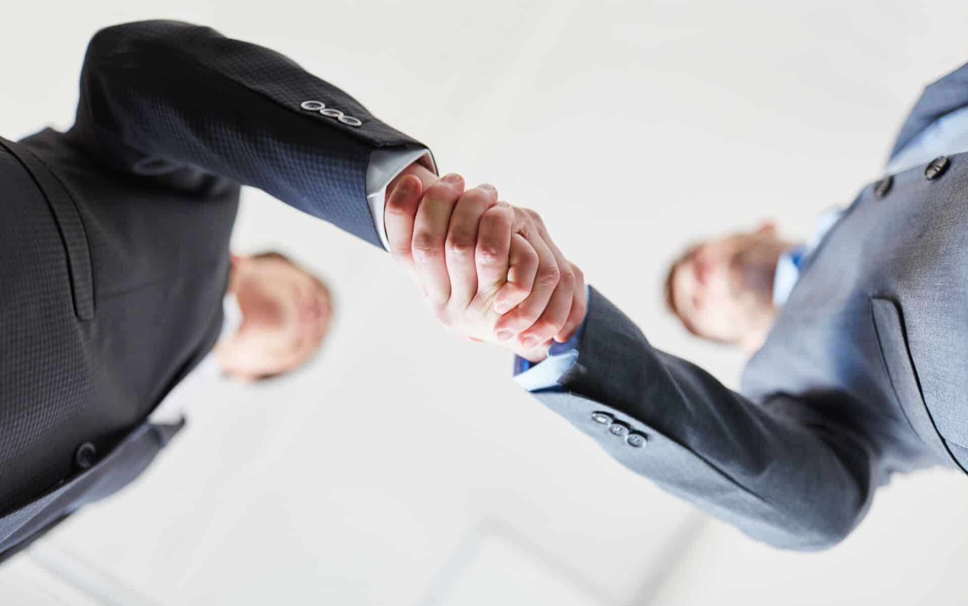 Prodato Zusammenarbeit Handschlag scaled